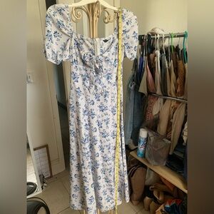 Classy/spring/summer Dress
old blue western print design 
47in Long & 13in Waist